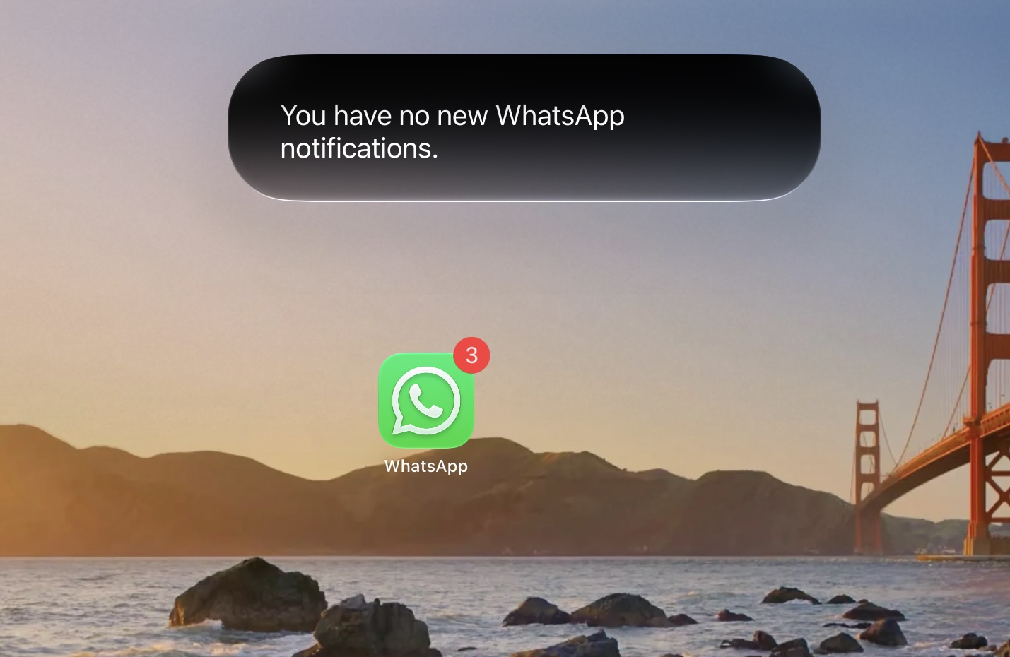 A screenshot of Siri saying there are no new WhatsApp notifications, with the WhatsApp icon that has 3 notifications