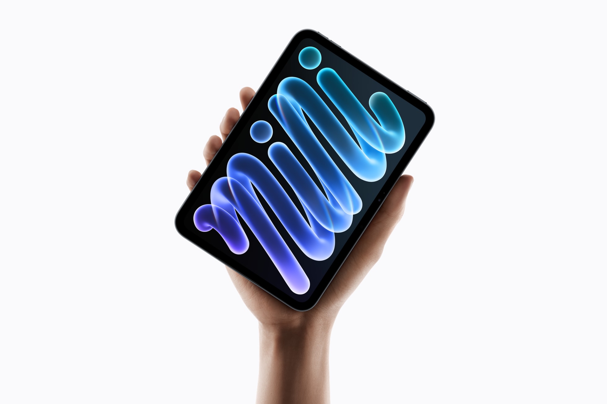 a person holding the new iPad mini